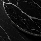 The Disc Coffee Table — Polished edge detail, Nero Marquina marble with white veining