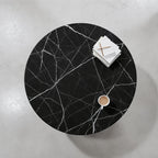 The Disc Coffee Table — Overhead view, perfect circle of Nero Marquina marble