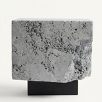 The Roman Plinth Grey Travertine — direct front view showing geological pores