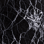 Nero Marquina black marble surface detail — dense white vein networks, geological close-up