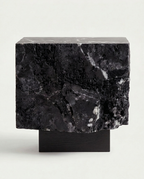 The Roman Plinth — travertine side table, living room, warm stone tones