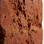 Red Travertine stone sample, 10 × 10 cm, honed face and raw reverse — Tobia Stones